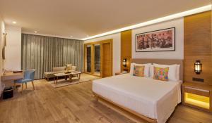 A bed or beds in a room at Country Inn Premier Amritsar - 10 min drive from Golden Temple