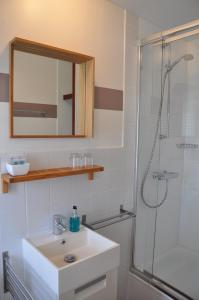 Een badkamer bij Hotel Bon Accueil