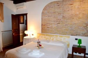 Postel nebo postele na pokoji v ubytování Luxury Trastevere