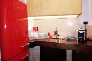 Kuchyň nebo kuchyňský kout v ubytování Luxury Trastevere