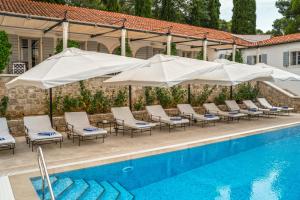 The swimming pool at or near Heritage Hotel Martinis Marchi