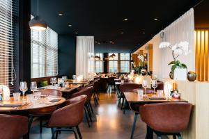 Restoran või mõni muu söögikoht majutusasutuses Boutique Hotel 'Hof ter Duinen'
