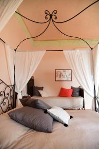 Llit o llits en una habitació de Giardino Arancio