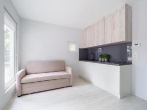 Kuchyňa alebo kuchynka v ubytovaní Parkova Apartamenty
