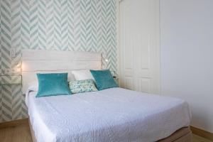 Posteľ alebo postele v izbe v ubytovaní Santa Marina Central Loft by Valcambre