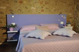 Postel nebo postele na pokoji v ubytování B&B IL VOLO