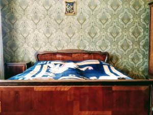 Postel nebo postele na pokoji v ubytování Guest House Ukimerioni