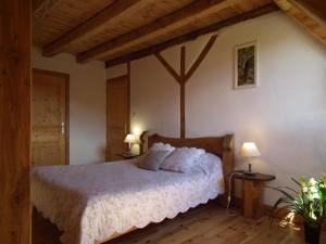 Postel nebo postele na pokoji v ubytování La Tarabelle