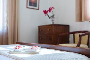 Posteľ alebo postele v izbe v ubytovaní Villa Rubini