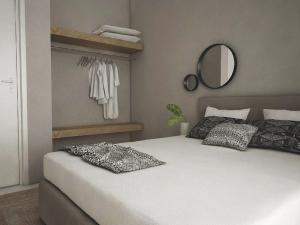 Posteľ alebo postele v izbe v ubytovaní Avres Apartments