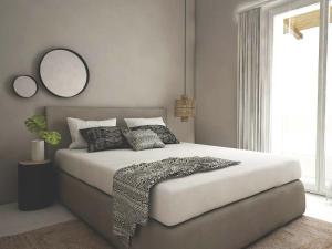 Posteľ alebo postele v izbe v ubytovaní Avres Apartments