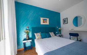 Postel nebo postele na pokoji v ubytování ASTAKOS apartments Budva