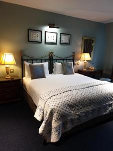 Voodi või voodid majutusasutuse The Listowel Arms Hotel toas