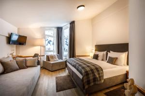 Ένα ή περισσότερα κρεβάτια σε δωμάτιο στο VALAMAR Obertauern