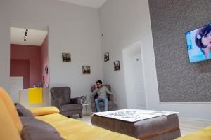 TV a/nebo společenská místnost v ubytování Travel Inn Hostel