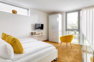 Postel nebo postele na pokoji v ubytování Hotel F-RITZ