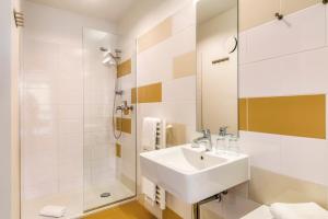 Koupelna v ubytování Hotel F-RITZ