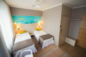 Posteľ alebo postele v izbe v ubytovaní Hotel Cristal Białystok