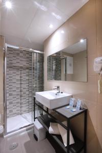 Koupelna v ubytování Hotel Brasil