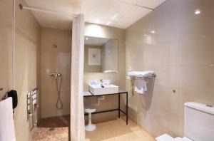Koupelna v ubytování Hotel Brasil
