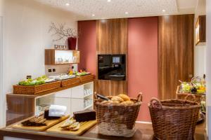 Kuchyň nebo kuchyňský kout v ubytování Hotel F-RITZ