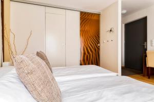 Postel nebo postele na pokoji v ubytování Hotel F-RITZ