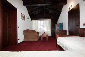 Postel nebo postele na pokoji v ubytování Family hotel Makedonska Kruchma