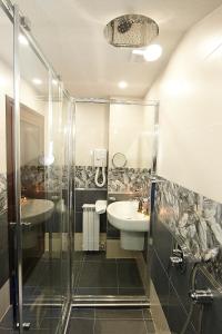 Koupelna v ubytování Family hotel Makedonska Kruchma
