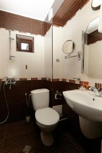 Koupelna v ubytování Family hotel Makedonska Kruchma