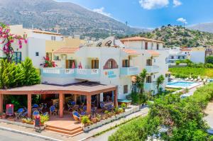 a view of a house with a pool at Ilios Stalis in Stalís