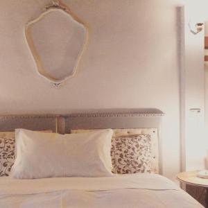 Postel nebo postele na pokoji v ubytování Corte di Maggio B&B