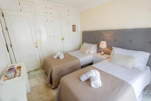 Кровать или кровати в номере Beach View Playa Del Moral