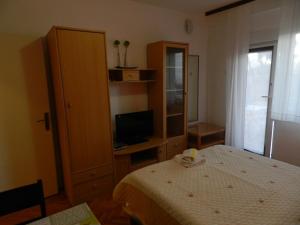 Postel nebo postele na pokoji v ubytování Levak Apartments - Apt.3