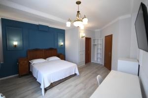 Ліжко або ліжка в номері Promenade Hotel