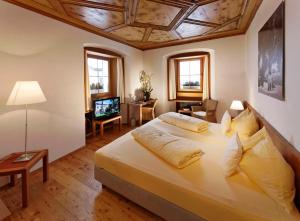 Postel nebo postele na pokoji v ubytování Hôtel Bodenhaus