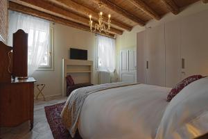 A bed or beds in a room at 28 Alla Rotonda