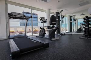 a gym with treadmills and cardio equipment in a building at Dazzler by Wyndham Lima San Isidro in Lima