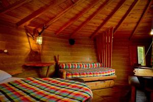 Postel nebo postele na pokoji v ubytování Logis Hôtel Andreinia & Cabanes