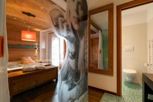 Kúpeľňa v ubytovaní Hotel Isolabella Wellness