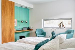 Postel nebo postele na pokoji v ubytování Hotel F-RITZ