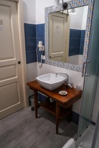 Kylpyhuone majoituspaikassa Palazzo Cestari Hotel