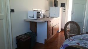 A kitchen or kitchenette at Villa Martelli