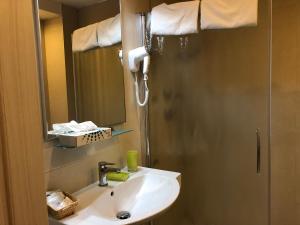 Kúpeľňa v ubytovaní Hotel Enrichetta