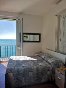 A bed or beds in a room at Sollevante Guest House