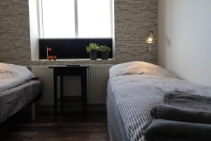 Postel nebo postele na pokoji v ubytování A-Bed