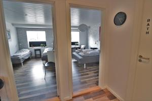 a view of a room with a living room and a bedroom at A-Bed in Esbjerg