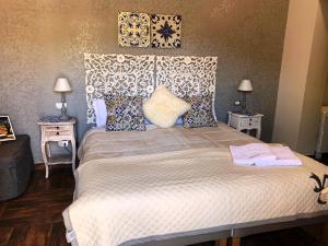 Posteľ alebo postele v izbe v ubytovaní B&B Villa del Sole Relais