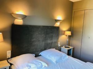 Postel nebo postele na pokoji v ubytování Cote d'opale