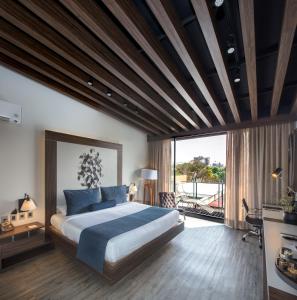 Uma cama ou camas num quarto em Flow Condesa - Adults Only