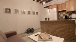 A kitchen or kitchenette at ALOJAMIENTO EN SEVILLA-TRIANA